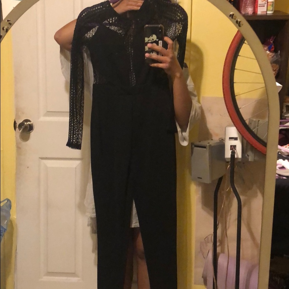 black pant suit with lace sleeves and back open